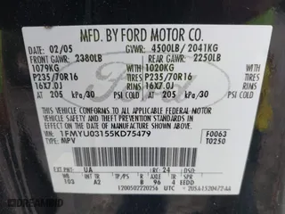 2005 Ford Escape XLT with VIN 1FMYU03155KD75479, listed as a IAAI auction lot 41757864 with 213,571 mi miles. Bid and sale history available at carsss.com. Image 9.