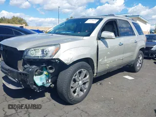 2014 GMC Acadia SLT z VIN 1GKKRSKD2EJ141913, wystawiony jako IAAI lot #41738536 z przebiegiem 100 577 mil mil oraz . Historia ofert i sprzedaży dostępna na DreamBid. Obrazek 2.