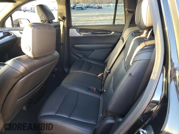 2023 Cadillac XT6 FWD Premium Luxury z VIN 1GYKPCRS7PZ105628, wystawiony jako Copart lot #84841124 z przebiegiem Nie podano mil oraz Szkoda całkowita • Salvage title. Historia ofert i sprzedaży dostępna na DreamBid. Obrazek 11.