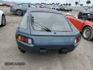1981 Porsche 928 z VIN WP0JA0929BS820364, wystawiony jako Copart lot #76286414 z przebiegiem 40 205 mil mil oraz Szkody całkowita. Historia ofert i sprzedaży dostępna na DreamBid. Obrazek 6.