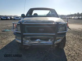 1998 Ford F-150 with VIN 1FTZF18W1WNA35212, listed as a Copart auction lot 45361785 with 227,735 mi miles and Salvage title. Bid and sale history available at DreamBid. Image 5.
