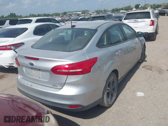 2017 Ford Focus SE with VIN 1FADP3FEXHL285064, listed as a IAAI auction lot 42528911 with 118,659 mi miles and . Bid and sale history available at DreamBid. Image 4.