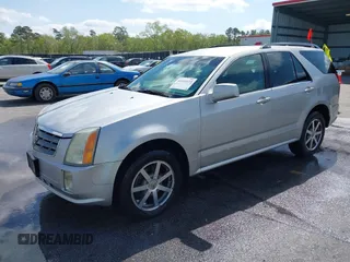2004 Cadillac SRX with VIN 1GYDE63A740111607, listed as a IAAI auction lot 41918519 with 239,042 mi miles. Bid and sale history available at carsss.com. Image 2.