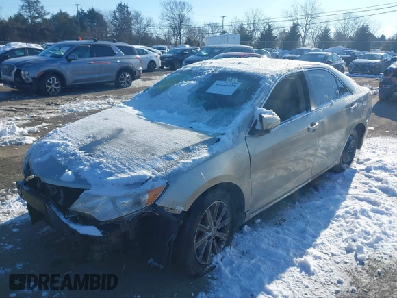 2014 Toyota Camry SE with VIN 4T1BK1FK6EU026342, listed as a IAAI auction lot 41246628 with 142,586 mi miles. Bid and sale history available at carsss.com. Image 2.