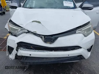 2017 Toyota RAV4 SE with VIN 2T3JFREV7HW637809, listed as a IAAI auction lot 42472464 with 173,273 mi miles and . Bid and sale history available at DreamBid. Image 6.