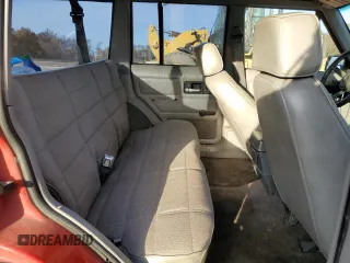 1994 Jeep Cherokee Sport with VIN 1J4FJ68S3RL239208, listed as a Copart auction lot 79121184 with 226,579 mi miles and Salvage title. Bid and sale history available at DreamBid. Image 11.
