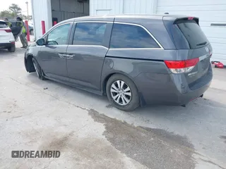 2014 Honda Odyssey EX-L with VIN 5FNRL5H67EB106183, listed as a IAAI auction lot 42210600 with 196,166 mi miles and . Bid and sale history available at DreamBid. Image 3.
