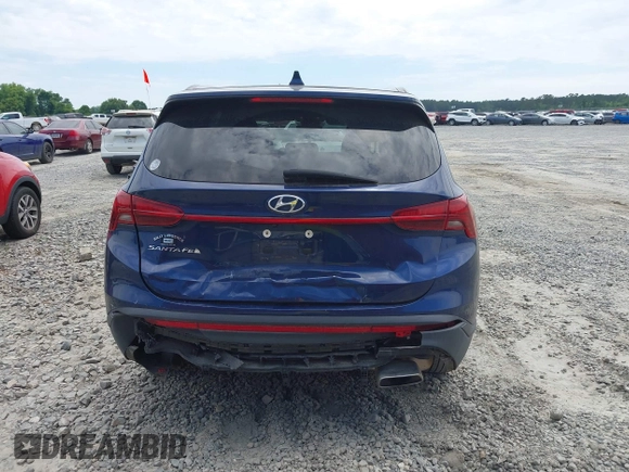 2021 Hyundai Santa Fe SE with VIN 5NMS14AJ2MH323542, listed as a IAAI auction lot 42182576 with 69,385 mi miles and . Bid and sale history available at DreamBid. Image 16.