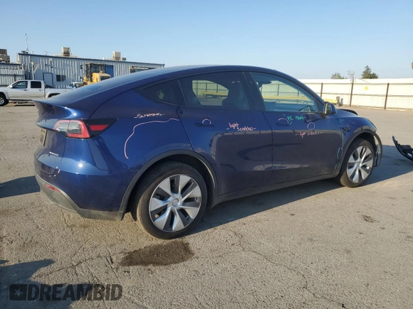 2023 Tesla Model Y Long Range with VIN 7SAYGDEE7PA146322, listed as a Copart auction lot 54071165 with 38,334 mi miles and Salvage Title. Bid and sale history available at DreamBid. Image 3.