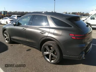 2023 Genesis GV70 2.5T with VIN KMUMADTB5PU139818, listed as a IAAI auction lot 41336368 with 609 mi miles and . Bid and sale history available at DreamBid. Image 3.