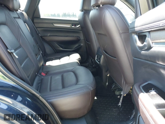 2019 Mazda CX-5 Signature with VIN JM3KFBEY7K0589236, listed as a IAAI auction lot 42078418 with 86,959 mi miles. Bid and sale history available at carsss.com. Image 8.