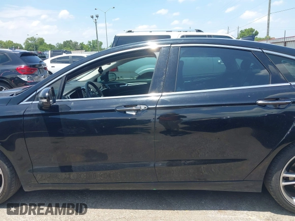 2016 Ford Fusion Titanium with VIN 3FA6P0K93GR113507, listed as a IAAI auction lot 42458659 with 133,708 mi miles and . Bid and sale history available at DreamBid. Image 15.