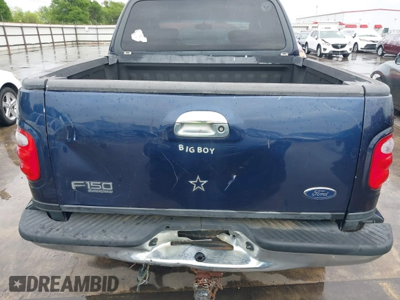2003 Ford F-150 XLT with VIN 1FTRW07L33KC83234, listed as a IAAI auction lot 41894573 with 215,232 mi miles. Bid and sale history available at carsss.com. Image 19.