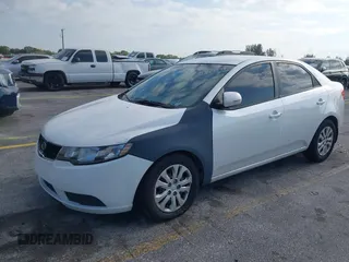 2013 Kia Forte EX with VIN KNAFU4A23D5731338, listed as a IAAI auction lot 42067997 with 130,300 mi miles. Bid and sale history available at carsss.com. Image 2.