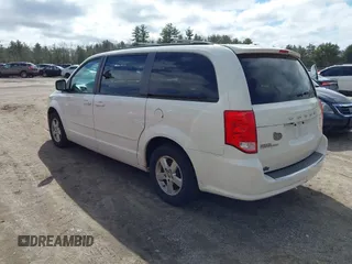 2012 Dodge Grand Caravan SXT with VIN 2C4RDGCGXCR248859, listed as a IAAI auction lot 41829411 with 111,515 mi miles and . Bid and sale history available at DreamBid. Image 3.