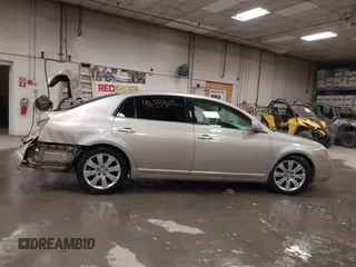 2007 Toyota Avalon XL z VIN 4T1BK36B17U232618, wystawiony jako IAAI lot #41633305 z przebiegiem 171 971 mil mil oraz . Historia ofert i sprzedaży dostępna na DreamBid. Obrazek 13.