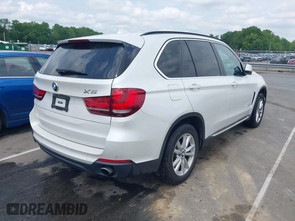 2014 BMW X5 sDrive35i z VIN 5UXKR2C54E0H34800, wystawiony jako IAAI lot #42110978 z przebiegiem 106 891 mil mil oraz . Historia ofert i sprzedaży dostępna na DreamBid. Obrazek 4.