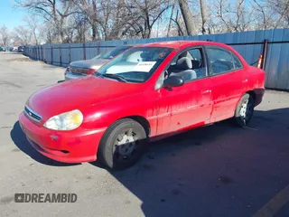 2002 Kia Rio with VIN KNADC123126182360, listed as a IAAI auction lot 41526651 with 82,052 mi miles. Bid and sale history available at carsss.com. Image 2.