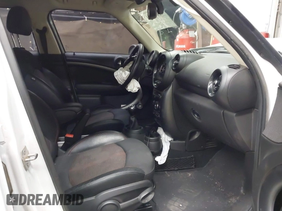 2015 MINI Countryman S with VIN WMWZC5C53FWT37722, listed as a IAAI auction lot 42151891 with 110,488 mi miles and . Bid and sale history available at DreamBid. Image 5.