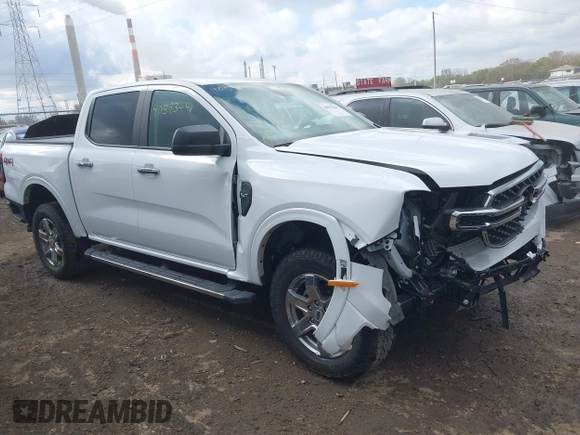 2024 Ford Ranger XLT with VIN 1FTER4HH1RLE20889, listed as a IAAI auction lot 40593441 with 7,499 mi miles. Bid and sale history available at carsss.com. Image 1.