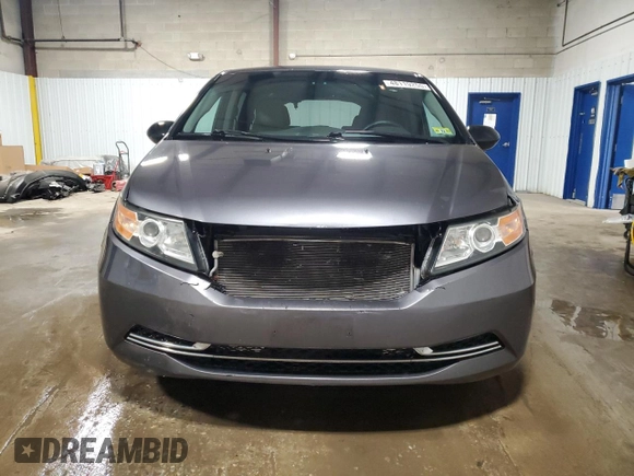 2015 Honda Odyssey LX with VIN 5FNRL5H25FB031580, listed as a Copart auction lot 48119255 with 143,552 mi miles and Salvage Title. Bid and sale history available at DreamBid. Image 5.