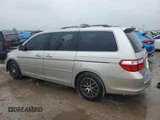 2005 Honda Odyssey EX with VIN 5FNRL38415B410659, listed as a Copart auction lot 58535455 with 198,250 mi miles and Salvage title. Bid and sale history available at DreamBid. Image 2.