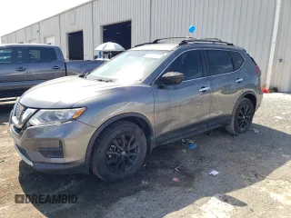 2017 Nissan Rogue SL with VIN 5N1AT2MT1HC887111, listed as a Copart auction lot 60065375 with 87,390 mi miles and Salvage title. Bid and sale history available at DreamBid. Image 1.