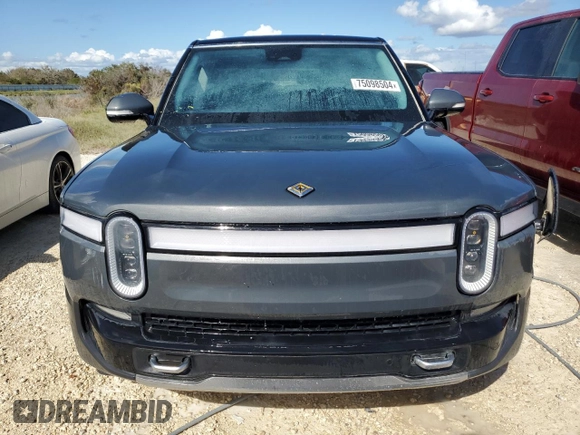 2024 Rivian R1S Adventure with VIN 7PDSGABA4RN031387, listed as a Copart auction lot 75098504 with Not Provided miles and Salvage Title. Bid and sale history available at carsss.com. Image 5.