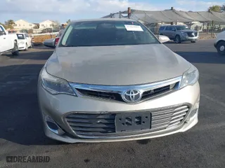 2014 Toyota Avalon Limited with VIN 4T1BK1EBXEU094015, listed as a IAAI auction lot 41415683 with 183,627 mi miles. Bid and sale history available at carsss.com. Image 6.