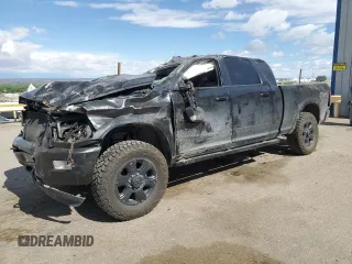 2018 Ram 2500 Laramie with VIN 3C6UR5NL7JG426666, listed as a Copart auction lot 56964865 with 77,686 mi miles and Salvage title. Bid and sale history available at DreamBid. Image 1.
