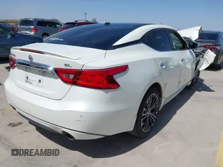 2016 Nissan Maxima SV z VIN 1N4AA6AP3GC900678, wystawiony jako IAAI lot #41837485 z przebiegiem 77 930 mil mil oraz . Historia ofert i sprzedaży dostępna na DreamBid. Obrazek 4.