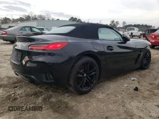 2020 BMW Z4 sDriveM40i with VIN WBAHF9C03LWW51901, listed as a Copart auction lot 36979053 with 23,486 mi miles. Bid and sale history available at carsss.com. Image 3.