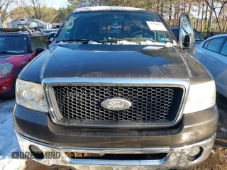 2007 Ford F-150 STX with VIN 1FTRX14W17FB65876, listed as a IAAI auction lot 41318821 with 206,254 mi miles. Bid and sale history available at carsss.com. Image 6.