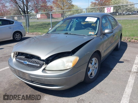 2002 Ford Taurus SE Standard with VIN 1FAFP53U02A215964, listed as a IAAI auction lot 42063534 with 187,424 mi miles and . Bid and sale history available at DreamBid. Image 2.