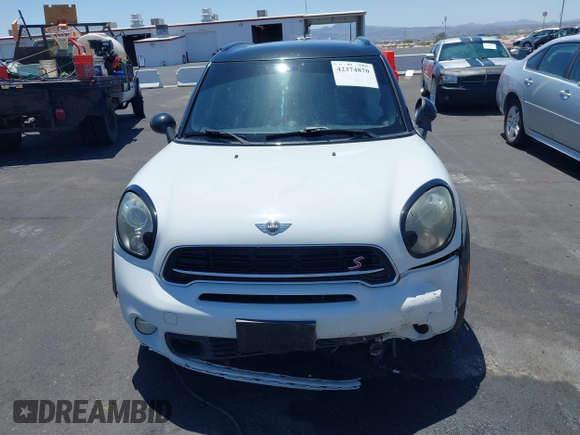 2015 MINI Countryman S with VIN WMWZC3C58FWT05613, listed as a IAAI auction lot 42374870 with 124,214 mi miles and . Bid and sale history available at DreamBid. Image 11.