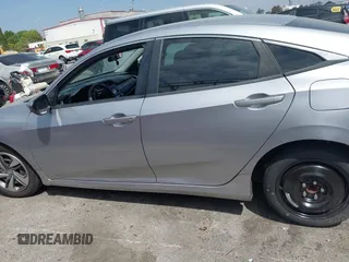 2019 Honda Civic Sedan LX with VIN 2HGFC2F61KH536965, listed as a IAAI auction lot 42030634 with 1 mi miles. Bid and sale history available at carsss.com. Image 14.