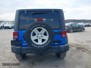 2015 Jeep Wrangler Sport with VIN 1C4AJWAG9FL747491, listed as a IAAI auction lot 41849106 with 84,226 mi miles. Bid and sale history available at carsss.com. Image 16.