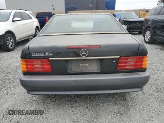 1990 Mercedes-Benz 500 z VIN WDBFA66E2LF013247, wystawiony jako Copart lot #53387305 z przebiegiem 121 472 mil mil oraz Szkoda całkowita • Salvage title. Historia ofert i sprzedaży dostępna na DreamBid. Obrazek 6.