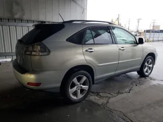 2005 Lexus RX 330 with VIN JTJGA31U350047347, listed as a Copart auction lot 44954765 with 217,444 mi miles and Salvage Title. Bid and sale history available at carsss.com. Image 3.