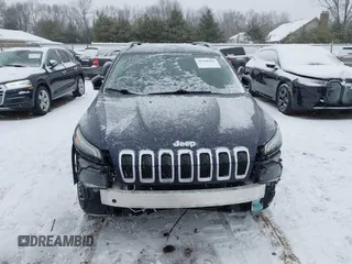 2014 Jeep Cherokee Altitude with VIN 1C4PJMCB9EW187288, listed as a IAAI auction lot 41320161 with 169,534 mi miles and . Bid and sale history available at DreamBid. Image 13.
