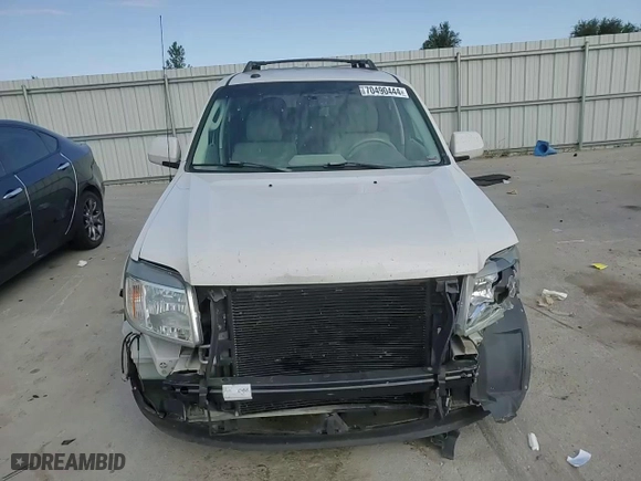 2010 Mercury Mariner Premier with VIN 4M2CN8HG5AKJ23663, listed as a Copart auction lot 70490444 with 154,328 mi miles and Salvage Title. Bid and sale history available at carsss.com. Image 10.