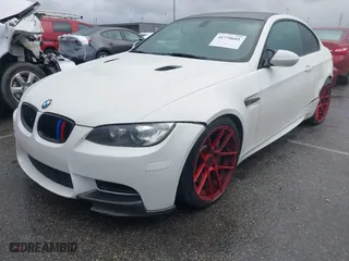 2011 BMW M3 with VIN WBSKG9C5XBE646032, listed as a IAAI auction lot 41778601 with 123,830 mi miles. Bid and sale history available at carsss.com. Image 2.