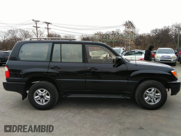 2000 Lexus LX 470 with VIN JT6HT00W8Y0100087, listed as a IAAI auction lot 41762294 with 274,720 mi miles and . Bid and sale history available at carsss.com. Image 14.