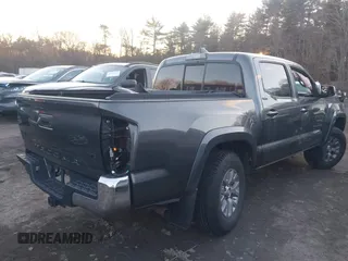 2017 Toyota Tacoma SR5 with VIN 3TMCZ5AN4HM104459, listed as a IAAI auction lot 41207997 with 80,103 mi miles and . Bid and sale history available at DreamBid. Image 4.