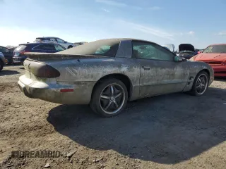 1999 Pontiac Firebird Firebird z VIN 2G2FS22K7X2214737, wystawiony jako Copart lot #77784414 z przebiegiem 93 670 mil mil oraz Czysty tytuł • Clean title. Historia ofert i sprzedaży dostępna na DreamBid. Obrazek 3.