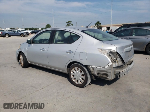 2012 Nissan Versa SV with VIN 3N1CN7AP7CL825501, listed as a Copart auction lot 63093735 with 129,227 mi miles and Salvage title. Bid and sale history available at DreamBid. Image 2.