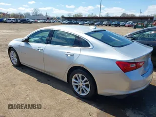 2018 Chevrolet Malibu LT with VIN 1G1ZD5ST8JF140336, listed as a IAAI auction lot 41972587 with 318,514 mi miles and . Bid and sale history available at DreamBid. Image 3.