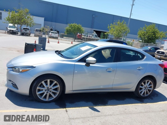 2017 Mazda 3 Touring with VIN 3MZBN1V76HM119389, listed as a IAAI auction lot 42772015 with 128,555 mi miles and . Bid and sale history available at DreamBid. Image 14.