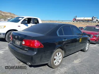 2007 Kia Optima EX with VIN KNAGE124175095989, listed as a IAAI auction lot 41637247 with 174,944 mi miles. Bid and sale history available at carsss.com. Image 4.