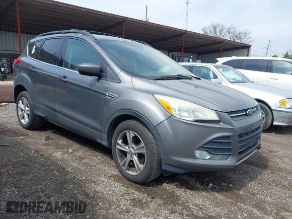 2013 Ford Escape SE with VIN 1FMCU0GX8DUB98700, listed as a IAAI auction lot 42012090 with 221,394 mi miles. Bid and sale history available at carsss.com. Image 1.